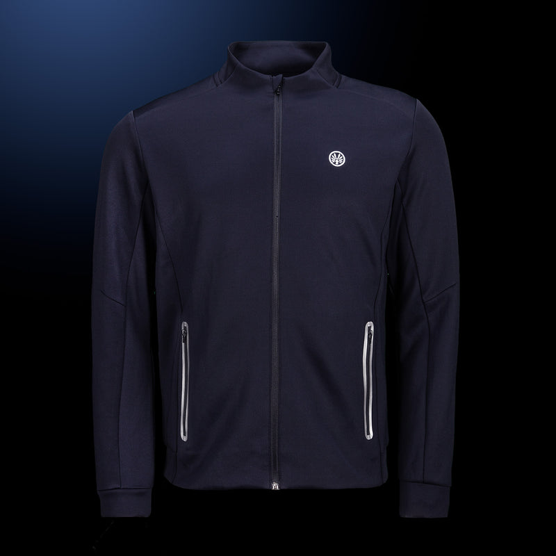 OLIVER Traingsjacke mit dezentem Logo  in marine-blau auf dunklem Hintergrund