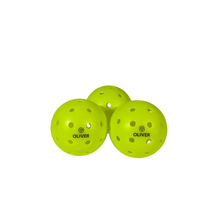 Drei OLIVER Pickleball Bälle mit Logo abgebildet auf einem dunklen Hintergrund