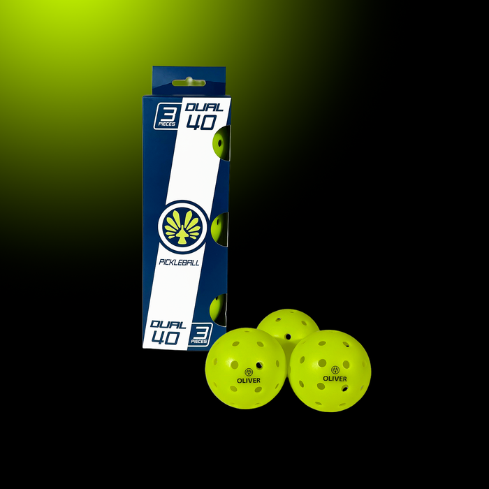 OLIVER Pickleball Bälle 3-er Set in einer blau-weißen Verpackung auf dunklem Hintergrund