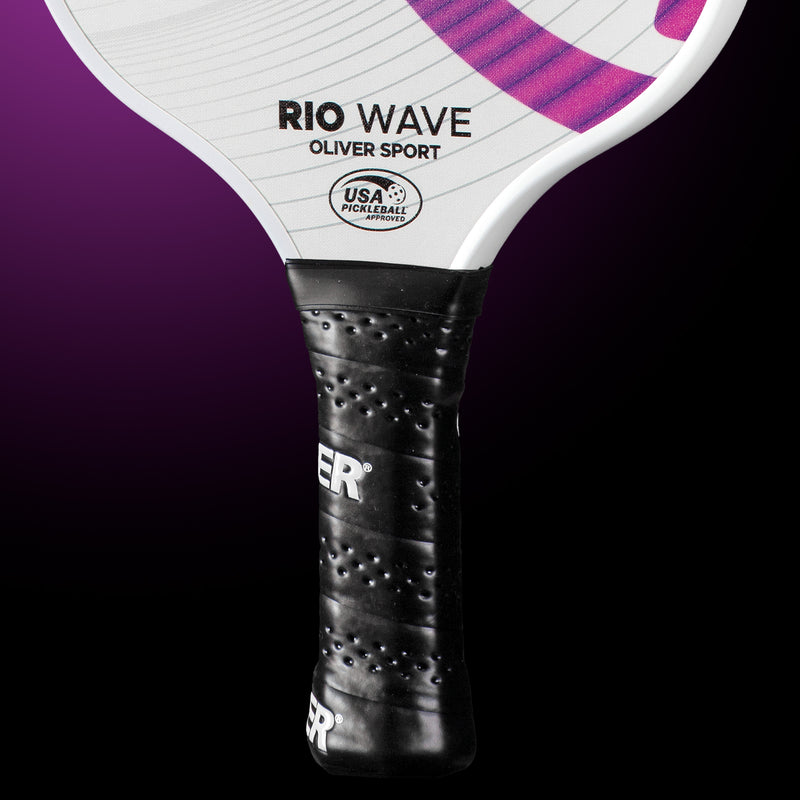 Oliver Pickleball Schläger Modell Rio Wave, weiß mit lila-pinkem Design, vor einem dunklen violetten Hintergrund