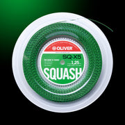 Grün-schwarze Oliver Squashsaite als Rolle vor einem dunklen grünen Hintergrund