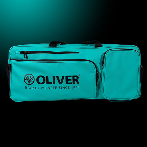 OLIVER Rackettasche EXTEND in türkisgrün auf dunklem Hintergrund.